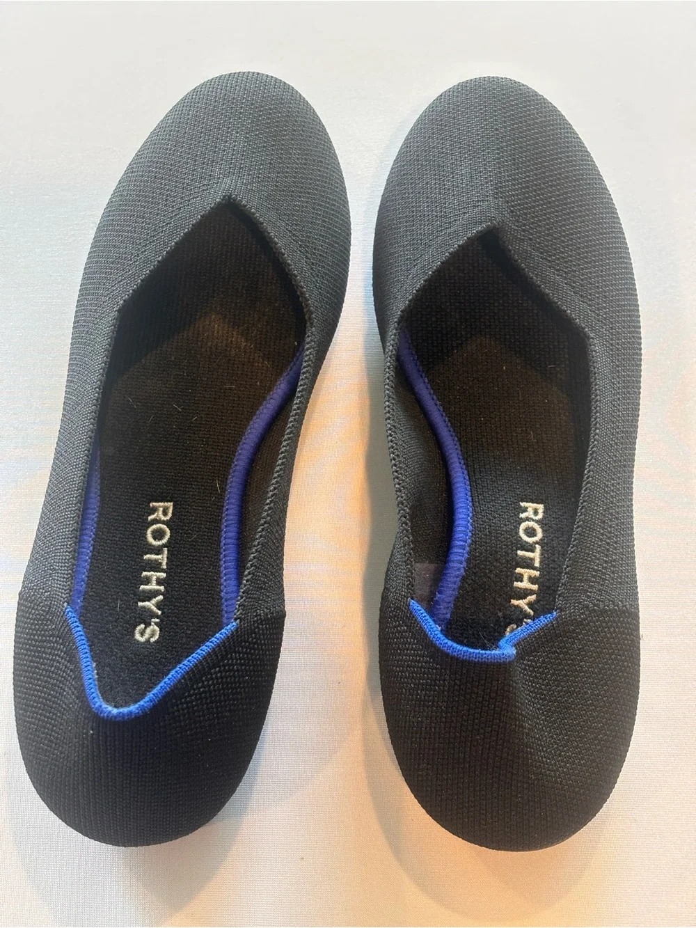 Rothy's Black Knit Flats with Blue Trim